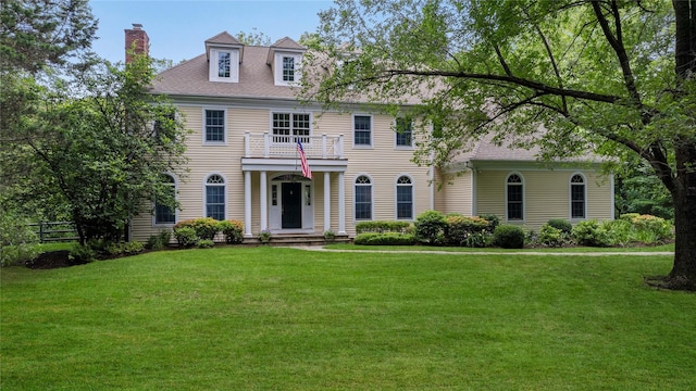 4 Hidden Valley Way, Bedford, NY 10506 - colonial home featuring a balcony, a chimney, and roof with shingles