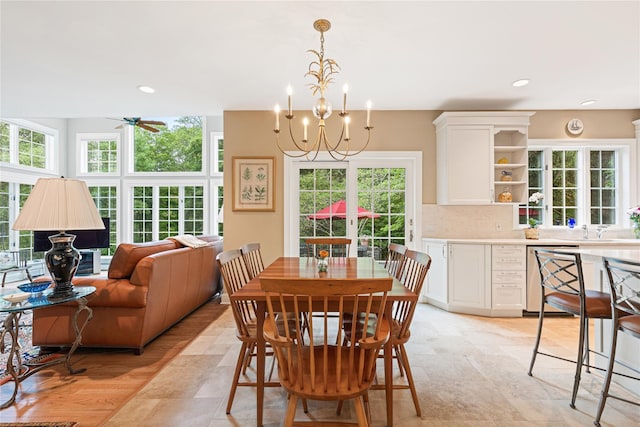 4 Hidden Valley Way, Bedford, NY 10506 - dining area with ceiling fan, a chandelier, recessed lighting, and light stone finish floors