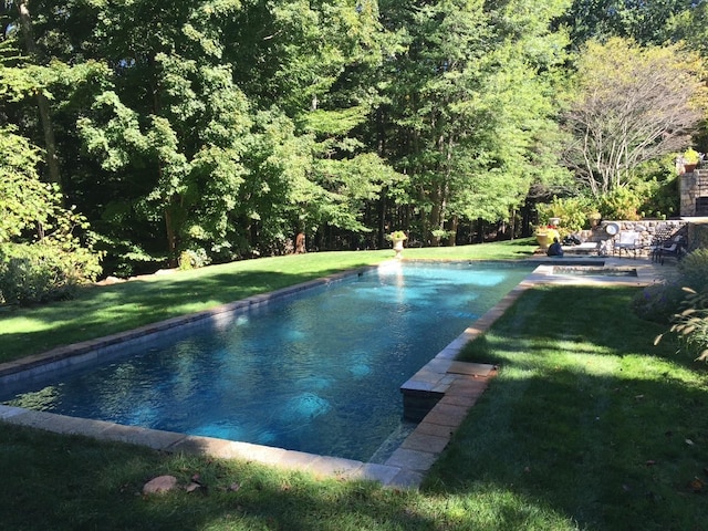 4 Hidden Valley Way, Bedford, NY 10506 - outdoor pool with a yard, a patio area, and a view of trees