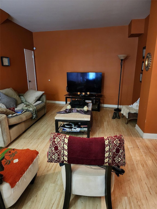 35-11 85th St Unit 1B, Jackson Heights, NY 11372 - living area with baseboards and wood finished floors