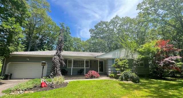 70 Sunny Line Dr, Calverton, NY 11933 - ranch-style house with an attached garage, a front lawn, driveway, and covered porch