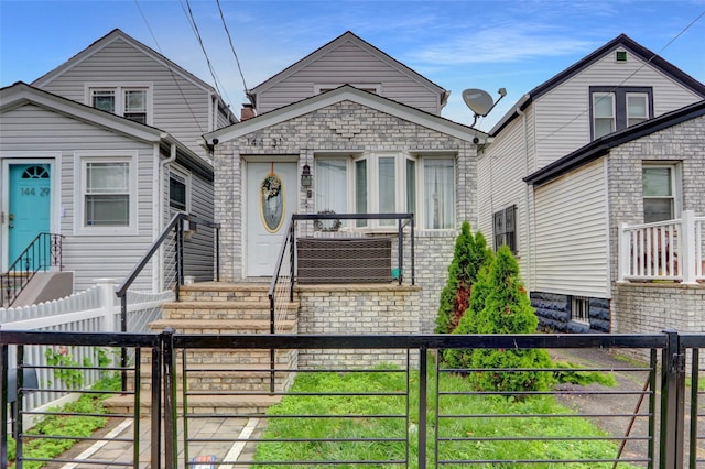 14431 166th St, Jamaica, NY 11434 - view of front of property with entry steps and a gate