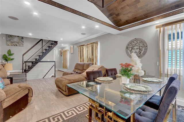 14431 166th St, Jamaica, NY 11434 - dining area featuring stairway, wood finished floors, vaulted ceiling, recessed lighting, and ornamental molding