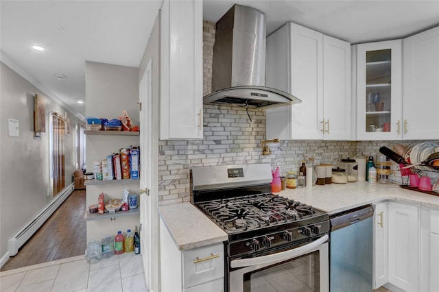 14431 166th St, Jamaica, NY 11434 - kitchen featuring stainless steel range with gas cooktop, wall chimney exhaust hood, a baseboard heating unit, dishwashing machine, and light stone counters