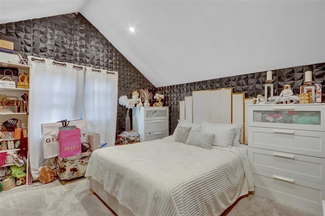 14431 166th St, Jamaica, NY 11434 - bedroom with lofted ceiling, wallpapered walls, and carpet