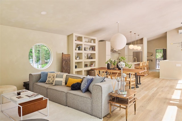 252 Swamp Pond Rd, Narrowsburg, NY 12764 - living room featuring light wood-style floors, healthy amount of natural light, and vaulted ceiling