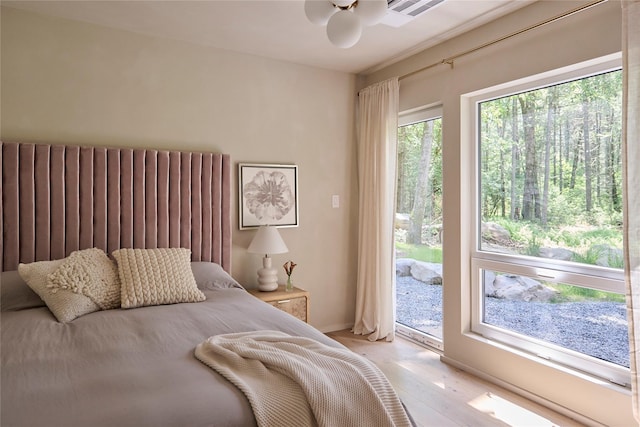 252 Swamp Pond Rd, Narrowsburg, NY 12764 - bedroom with access to exterior and light wood finished floors