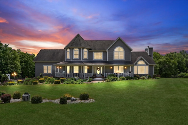 40 Rapelje Rd, Walden, NY 12586 - victorian-style house featuring a chimney, a front yard, and a porch