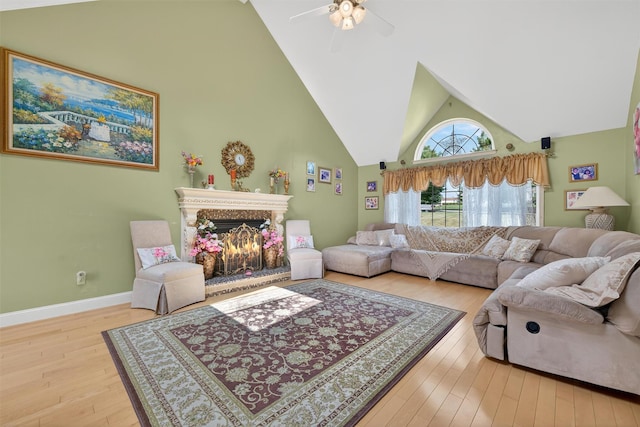 40 Rapelje Rd, Walden, NY 12586 - living room featuring high vaulted ceiling, wood-type flooring, ceiling fan, and a high end fireplace