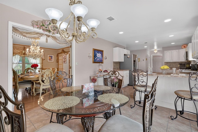 40 Rapelje Rd, Walden, NY 12586 - dining space with a chandelier, light tile patterned floors, and recessed lighting