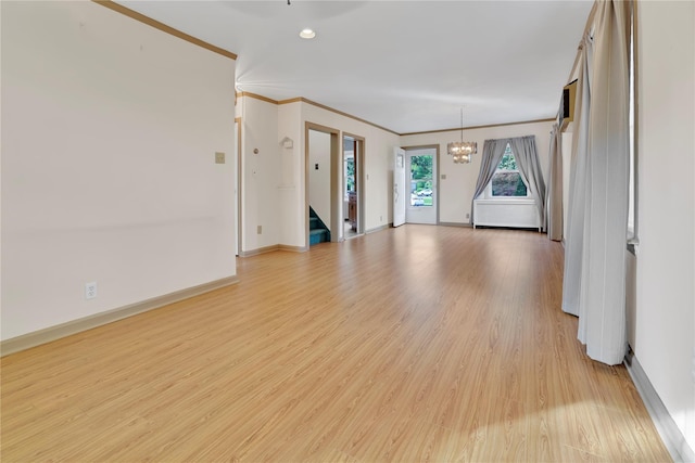 33 Park Cir, New Hyde Park, NY 11040 - unfurnished room featuring a chandelier, crown molding, light wood-style floors, stairway, and recessed lighting