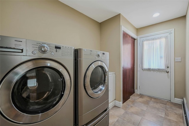 160 Coachman Pl E, Syosset, NY 11791 - laundry area featuring washer and clothes dryer and baseboard heating