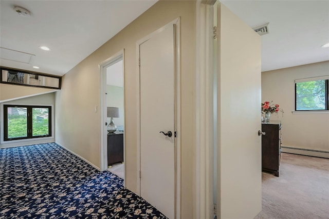 160 Coachman Pl E, Syosset, NY 11791 - hall with light carpet, a baseboard heating unit, and recessed lighting