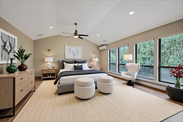 160 Coachman Pl E, Syosset, NY 11791 - bedroom featuring a wall mounted air conditioner, wood finished floors, lofted ceiling, a ceiling fan, and recessed lighting