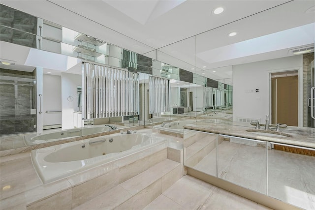 160 Coachman Pl E, Syosset, NY 11791 - full bath featuring a tub with jets, vanity, recessed lighting, tile patterned flooring, and a shower stall