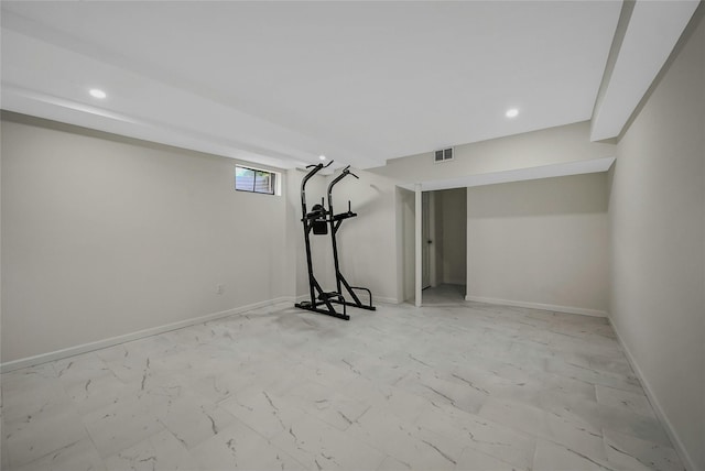 160 Coachman Pl E, Syosset, NY 11791 - basement with recessed lighting and light marble finish flooring