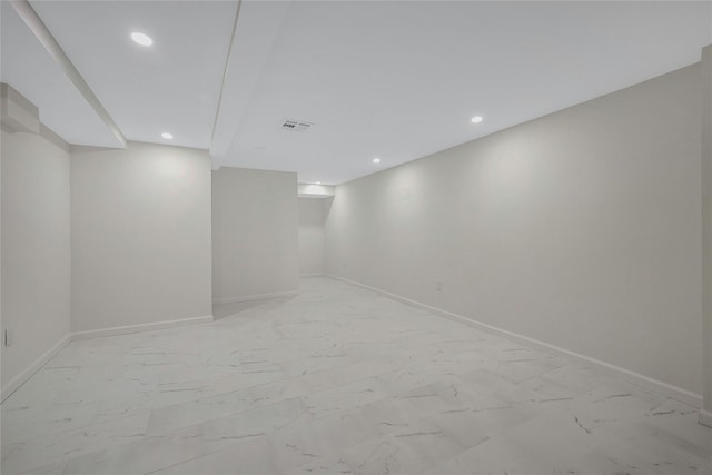 160 Coachman Pl E, Syosset, NY 11791 - finished basement featuring recessed lighting and light marble finish floors