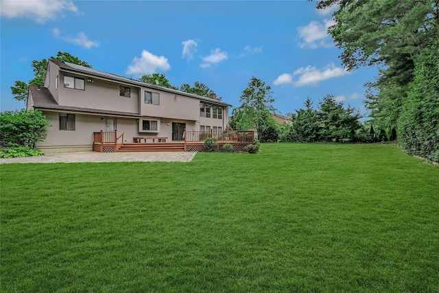 160 Coachman Pl E, Syosset, NY 11791 - back of house featuring a lawn and a deck