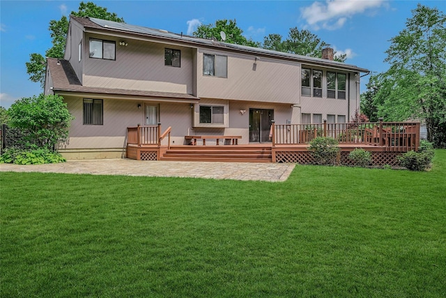 160 Coachman Pl E, Syosset, NY 11791 - rear view of house featuring a patio area, a chimney, a yard, and a deck