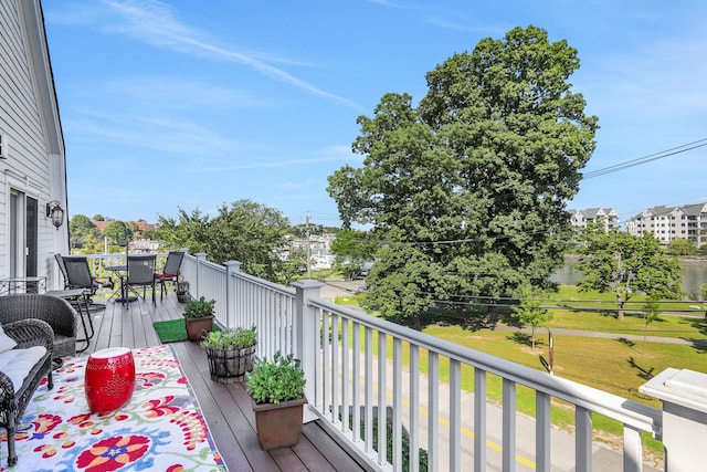 2 Harbor Ln Unit 301, New Rochelle, NY 10805 - wooden deck featuring outdoor dining area