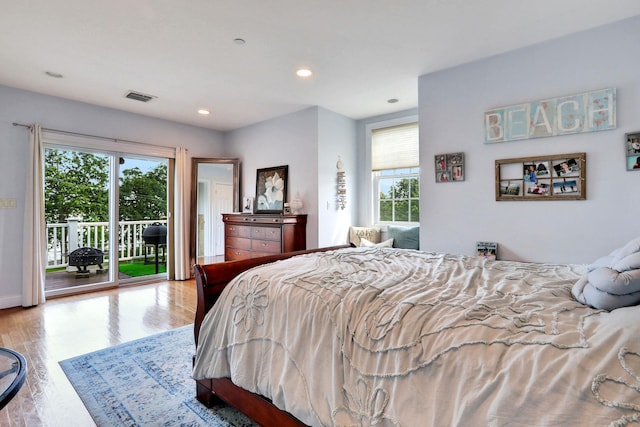 2 Harbor Ln Unit 301, New Rochelle, NY 10805 - bedroom featuring access to outside, multiple windows, wood finished floors, and recessed lighting