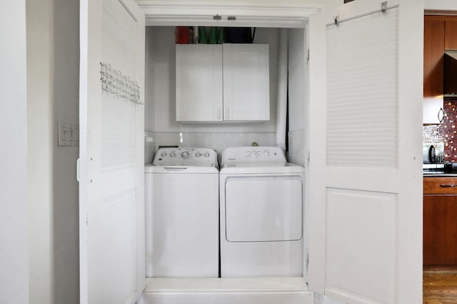 2 Harbor Ln Unit 301, New Rochelle, NY 10805 - laundry room with cabinet space and separate washer and dryer