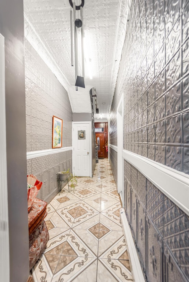 2370 Atlantic Ave, Brooklyn, NY 11233 - hallway featuring tile patterned floors, an ornate ceiling, and vaulted ceiling