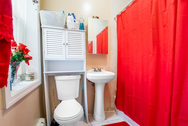 2370 Atlantic Ave, Brooklyn, NY 11233 - full bath featuring tile patterned floors, a shower with shower curtain, and baseboard heating