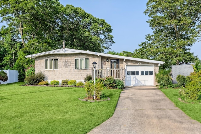 10 Jan Ct, Ronkonkoma, NY 11779 - view of front of home featuring driveway and a garage