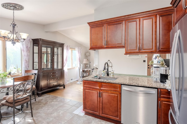 10 Jan Ct, Ronkonkoma, NY 11779 - kitchen featuring appliances with stainless steel finishes, a chandelier, light stone counters, pendant lighting, and light tile patterned floors