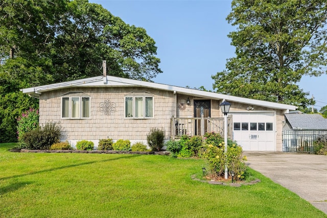10 Jan Ct, Ronkonkoma, NY 11779 - ranch-style home featuring an attached garage, driveway, and a front lawn