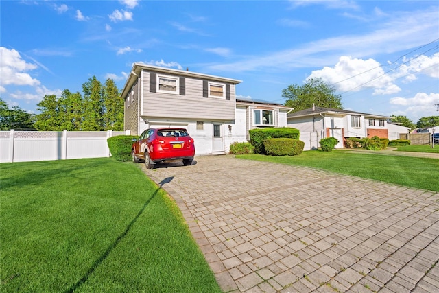 343 W 16th St, Deer Park, NY 11729 - view of front of home featuring decorative driveway