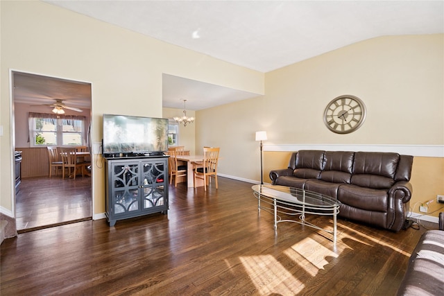 343 W 16th St, Deer Park, NY 11729 - living room with dark wood finished floors, lofted ceiling, and a chandelier