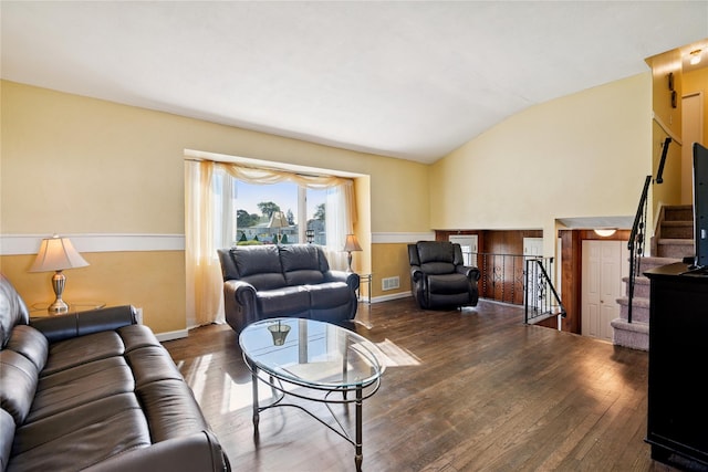 343 W 16th St, Deer Park, NY 11729 - living area featuring vaulted ceiling, wood-type flooring, and stairway