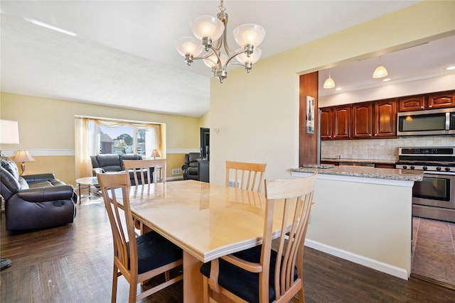 343 W 16th St, Deer Park, NY 11729 - dining area featuring a chandelier and dark wood-type flooring