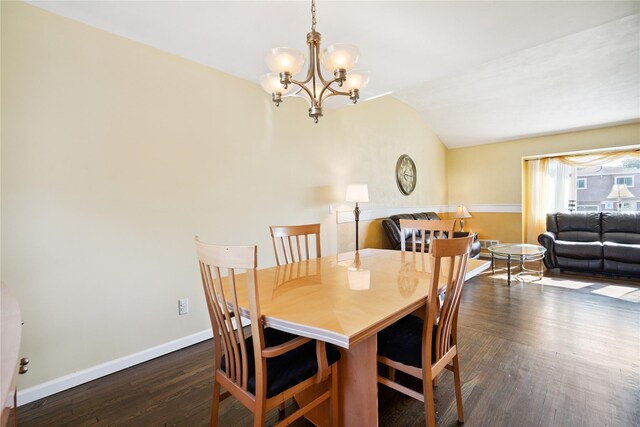 343 W 16th St, Deer Park, NY 11729 - dining space with wood finished floors, vaulted ceiling, and a chandelier