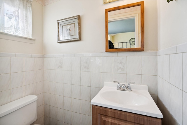 343 W 16th St, Deer Park, NY 11729 - bathroom featuring tile walls and vanity