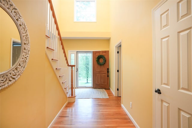 212 Weber Hill Rd, Carmel, NY 10512 - entrance foyer with a towering ceiling, light wood-type flooring, and stairs