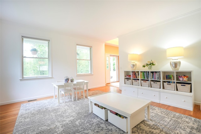212 Weber Hill Rd, Carmel, NY 10512 - living area featuring ornamental molding, wood finished floors, and healthy amount of natural light