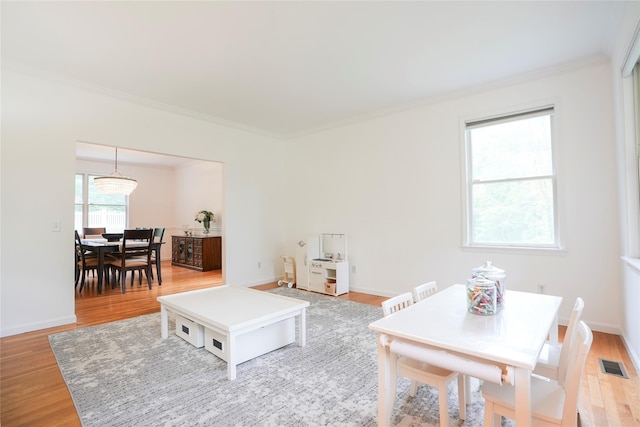 212 Weber Hill Rd, Carmel, NY 10512 - living room featuring ornamental molding and light wood-type flooring