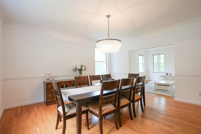 212 Weber Hill Rd, Carmel, NY 10512 - dining room with a chandelier, ornamental molding, and light wood-style floors