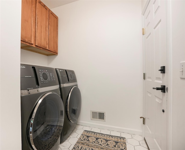 212 Weber Hill Rd, Carmel, NY 10512 - washroom with independent washer and dryer, cabinet space, and light tile patterned floors
