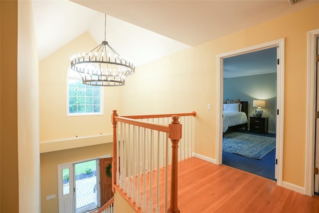 212 Weber Hill Rd, Carmel, NY 10512 - stairway featuring healthy amount of natural light, wood finished floors, a chandelier, and lofted ceiling