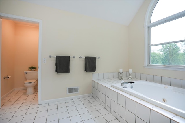212 Weber Hill Rd, Carmel, NY 10512 - bathroom featuring a jetted tub, vaulted ceiling, and tile patterned floors