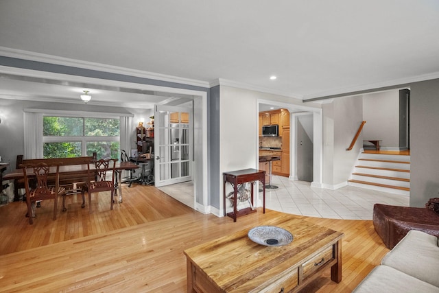 63 Bonnie Meadow Rd, Scarsdale, NY 10583 - living area featuring stairway, crown molding, light wood-type flooring, and recessed lighting