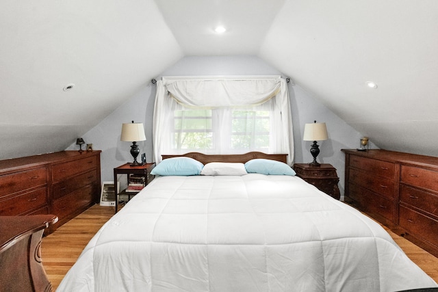 63 Bonnie Meadow Rd, Scarsdale, NY 10583 - bedroom featuring wood finished floors and vaulted ceiling