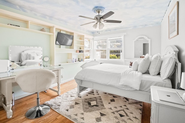 63 Bonnie Meadow Rd, Scarsdale, NY 10583 - bedroom featuring wood finished floors and a ceiling fan