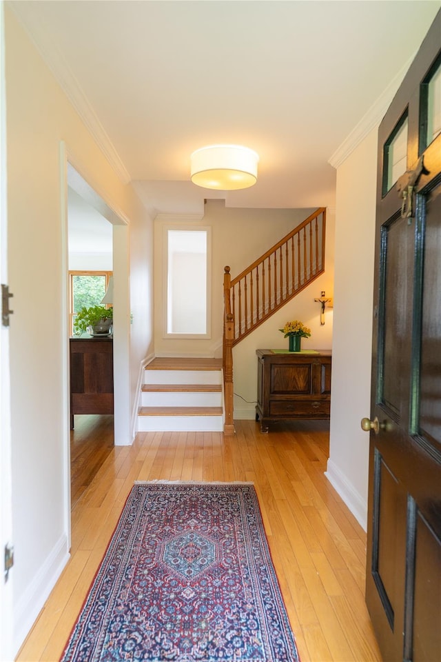 81 Seaview Ave, New Rochelle, NY 10801 - entrance foyer with light wood finished floors, stairway, and ornamental molding