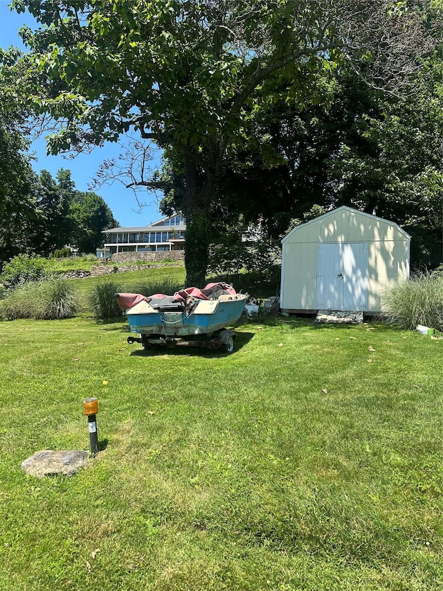 81 Seaview Ave, New Rochelle, NY 10801 - view of grassy yard with a storage unit