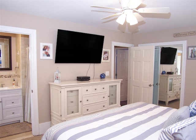 68 Palmer Dr, Sayville, NY 11782 - bedroom featuring ensuite bath, a ceiling fan, and light colored carpet